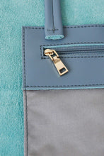 Load image into Gallery viewer, Inside zipped pocket of Hoopla leather blue grey tote. 