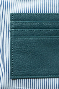 Leather card slots in Hoopla teal leather crossbody bag, Hoopla brand. 
