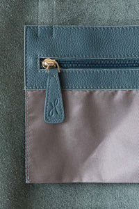 Internal pocket with gold zip for the buttery soft pebbled leather teal tote with zip from Hoopla. 