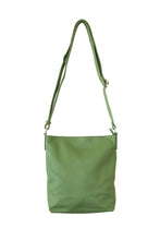Load image into Gallery viewer, Front view of forest green, buttery soft, cow leather crossbody bag. Silver zip and buckles. 