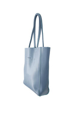 Load image into Gallery viewer, Side view of Hoopla leather blue grey tote with long padded handles.