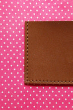 Load image into Gallery viewer, Pink with white polka dot cotton lining on a brown leather clutch