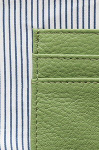 Close up of internal credit card pockets in bright green pebbled leather Hoopla coin and card purse