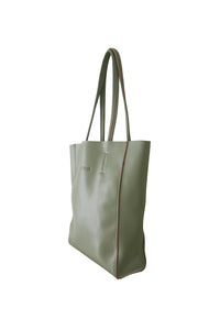 Side view of Hoopla leather olive green portrait tote with long padded handles.