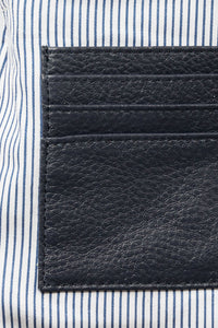 Leather card slots in Hoopla navy leather crossbody bag, Hoopla brand. 