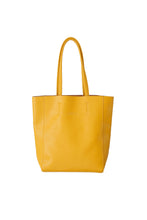 Load image into Gallery viewer, Front view of Hoopla leather mustard portrait tote with long handles