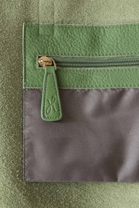 Internal pocket with gold zip for the buttery soft pebbled leather bright green tote with zip from Hoopla. 