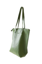 Load image into Gallery viewer, Side view of buttery bright green soft pebbled leather Hoopla tote bag with a gold coloured zip. 