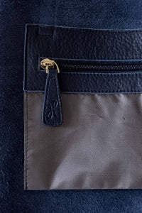 Internal pocket with gold zip for the buttery soft pebbled leather navy tote with zip from Hoopla. 